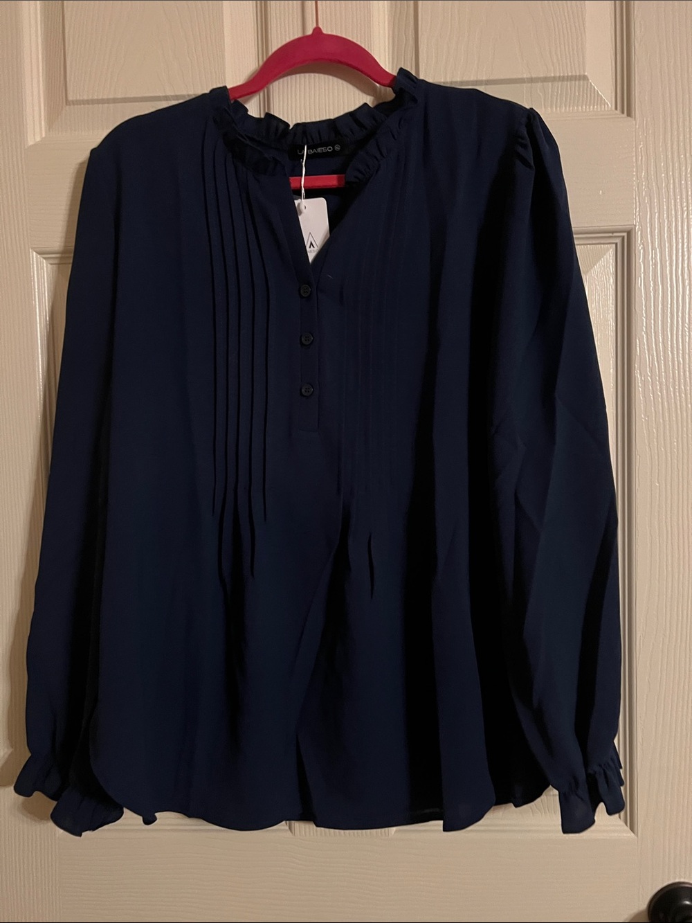 Pleated Navy Button-Front Blouse with Ruffle Collar
